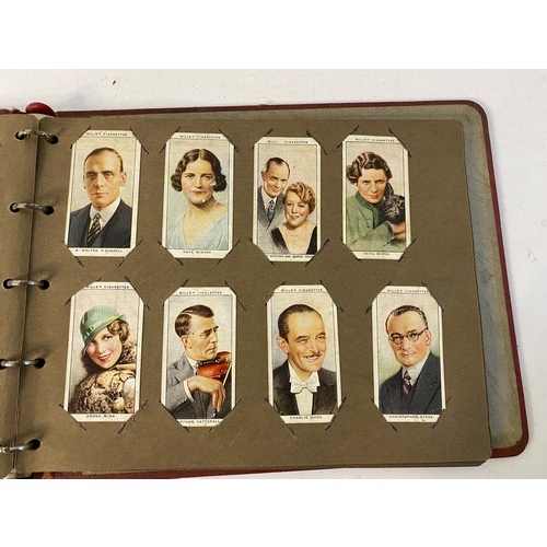 976 - Cigarette card album with loose cards, stamps and post cards.