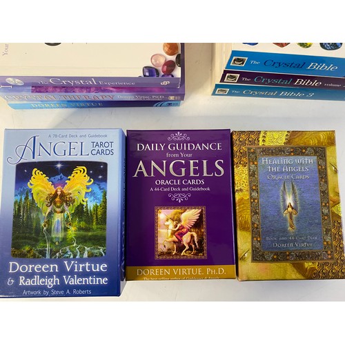 110 - Selection of books on crystals, angels and tarot. Also 3 sets of Doreen Virtue angel cards.