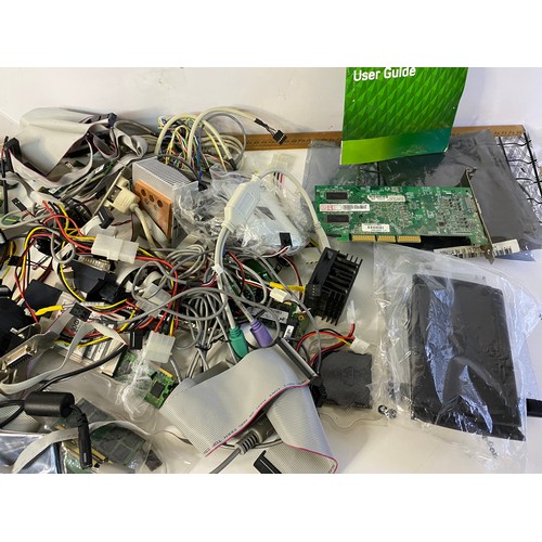 114 - Large selection of computer parts including power supplies, chips, fans and cables.