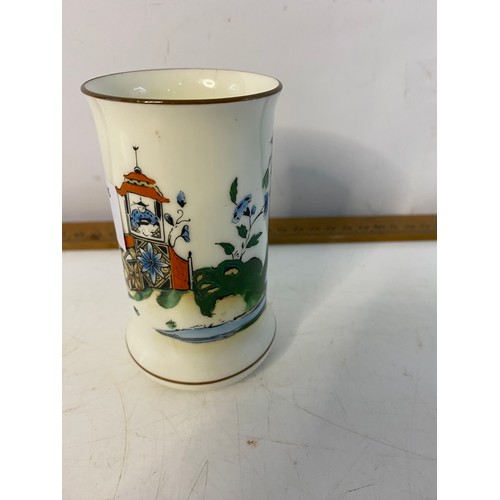 131 - Royal Worcester Chinoiserie spill vase c.1910 stands 10.5cm tall. Has a 7mm fine hairline crack to t... 