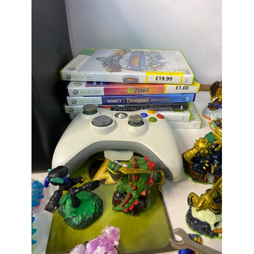 136 - Xbox 360s console with Skylanders bundle, games and accessories, tested and working.