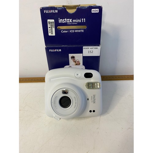 152 - Fugifilm instax mini instant camera in box. No film included but it is available to buy online.