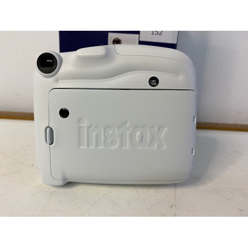 152 - Fugifilm instax mini instant camera in box. No film included but it is available to buy online.