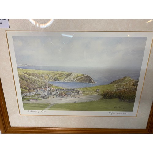 154 - 2 Robin Davidson hand signed framed prints, Lulworth Cove and Swanage Bay. Largest is 43x33cms.