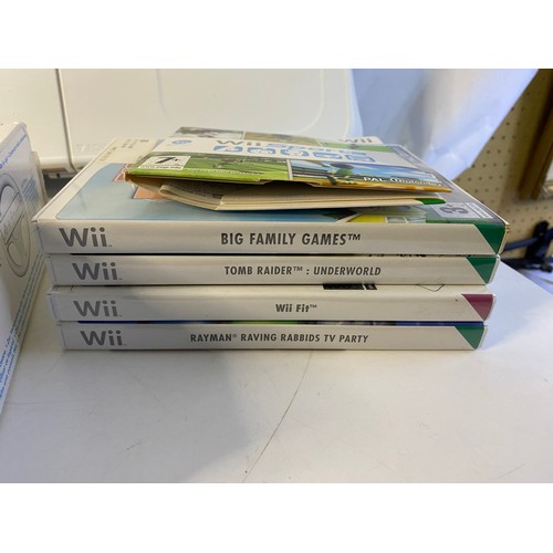 170 - Nintendo Wii with games and accessories including fit board, Mariokart, sport pack and more. Tested ... 