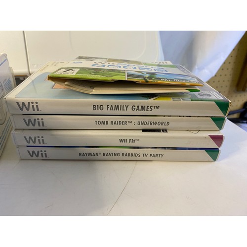 170 - Nintendo Wii with games and accessories including fit board, Mariokart, sport pack and more. Tested ... 