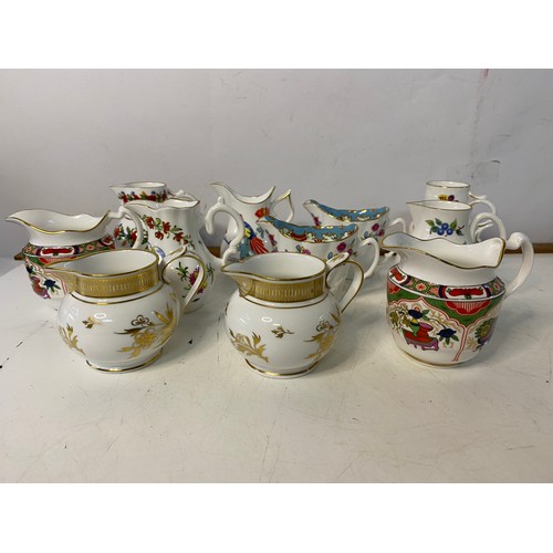 297 - Selection of small decorative jugs from Royal Worcester. Tallest is 10cms.