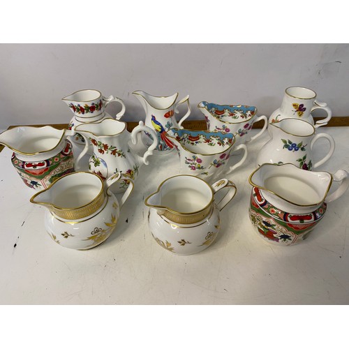 297 - Selection of small decorative jugs from Royal Worcester. Tallest is 10cms.