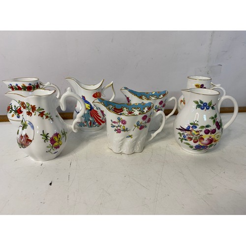 297 - Selection of small decorative jugs from Royal Worcester. Tallest is 10cms.