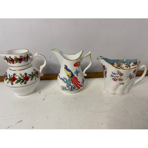 297 - Selection of small decorative jugs from Royal Worcester. Tallest is 10cms.