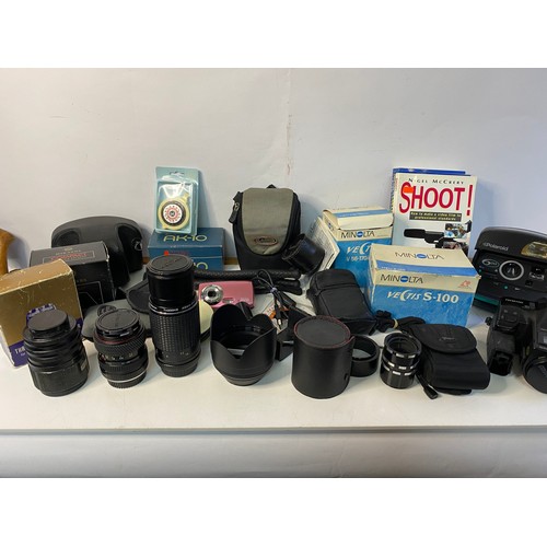 245 - Selection of vintage and modern cameras and accessories including Polaroid 600, various lenses, 35mm... 