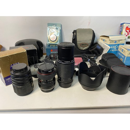 245 - Selection of vintage and modern cameras and accessories including Polaroid 600, various lenses, 35mm... 