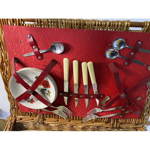 500 - Vintage wicker picnic hamper with selection of plates, thermos, tupperware boxes, cutlery