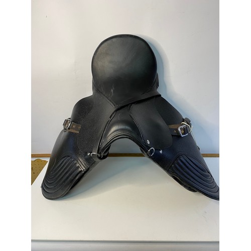 7 - Leather saddle in great condition.