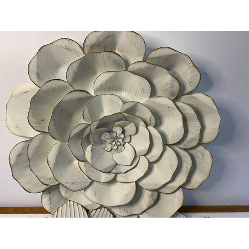 82 - Trio of metal wall flowers. largest is 56cms across