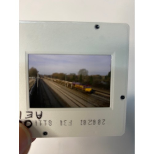 89 - Tray of approximately 100 bus, tram and train 35mm slides