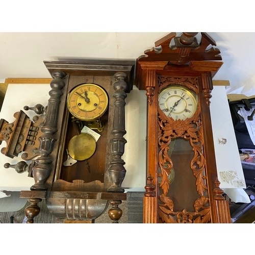 495 - 2 vintage ornate wall clocks, largest measures 72 cms tall