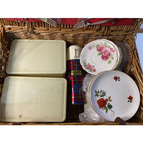 500 - Vintage wicker picnic hamper with selection of plates, thermos, tupperware boxes, cutlery