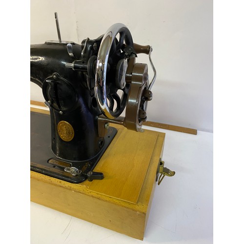 608 - Vintage Singer 201k hand crank sewing machine in carry case. dated 1946