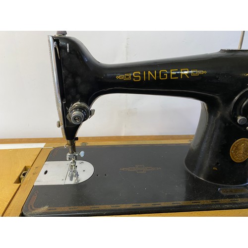 608 - Vintage Singer 201k hand crank sewing machine in carry case. dated 1946