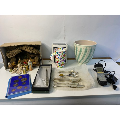 998 - Box of curios including large Poole vase, nativity scene, mug, cutlery and coinage of GB and NI 1977