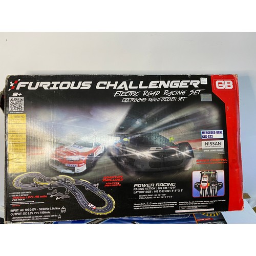 650 - 3 boxed racing sets including Scalextric Velodrome cycling set.