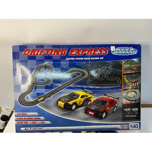 650 - 3 boxed racing sets including Scalextric Velodrome cycling set.