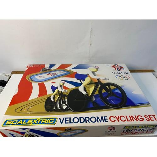 650 - 3 boxed racing sets including Scalextric Velodrome cycling set.