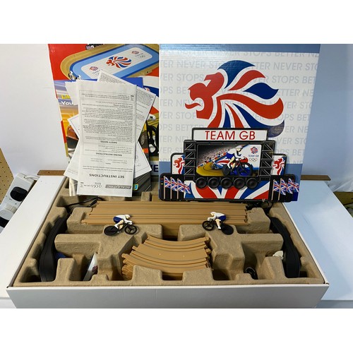 650 - 3 boxed racing sets including Scalextric Velodrome cycling set.