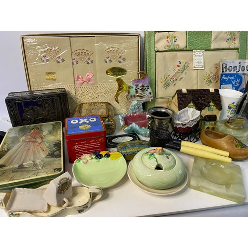 664 - Assortment of vintage and collectable curios including ceramics, old tins and clocks.