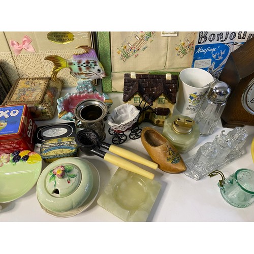 664 - Assortment of vintage and collectable curios including ceramics, old tins and clocks.