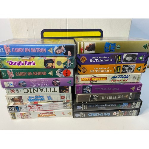 667 - Box of VHS tapes including big box ex rental, bands and music, Adult Humour.