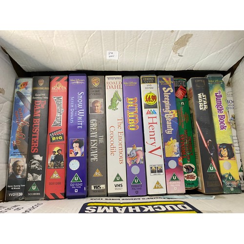 667 - Box of VHS tapes including big box ex rental, bands and music, Adult Humour.