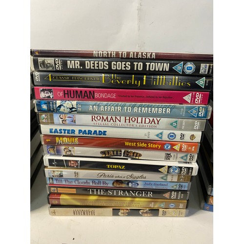 676 - Box of vintage and classic films on DVD