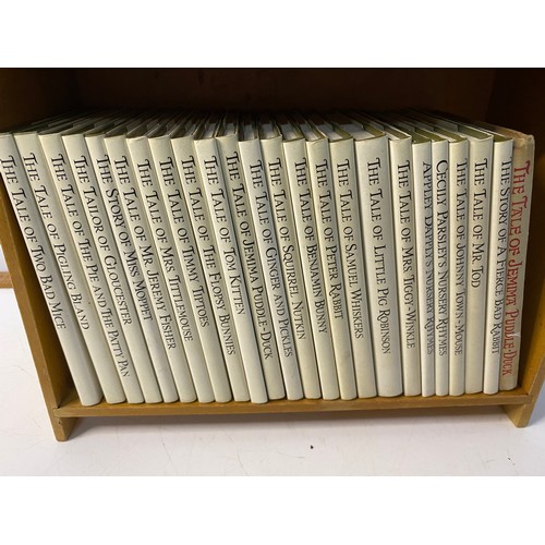 677 - Vintage Peter Rabbbit book shelf with 24 Beatrix Potter books