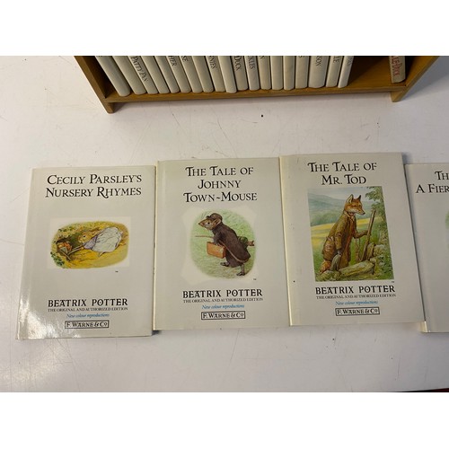 677 - Vintage Peter Rabbbit book shelf with 24 Beatrix Potter books