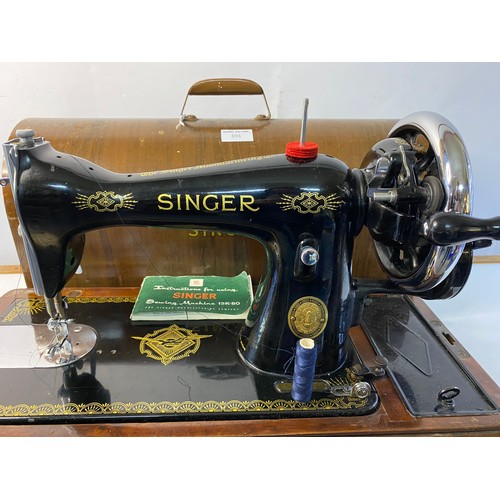 691 - 1950s Singer 15K-80 hand crank sewing machine in domed wooden case.