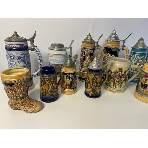 696 - Collection of vintage Steins and Tankards some musical and some from Avon