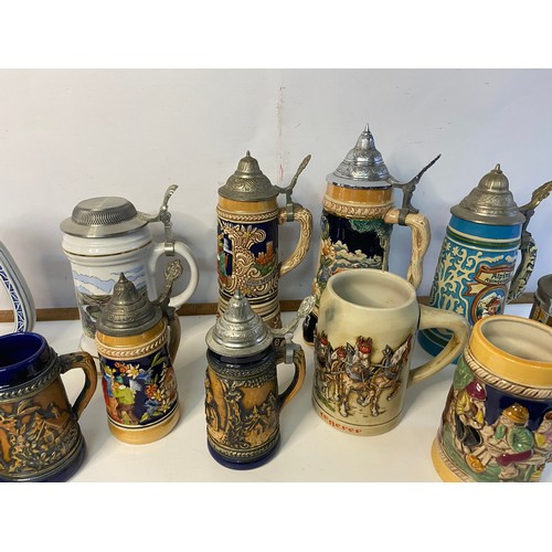 696 - Collection of vintage Steins and Tankards some musical and some from Avon