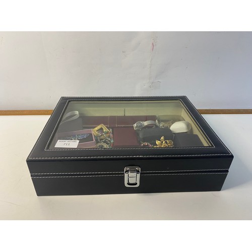 711 - Assortment of costume jewellery both vintage and modern in display boxes.