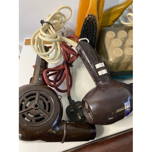 698 - Selection of vintage and retro household items including hairdryers.