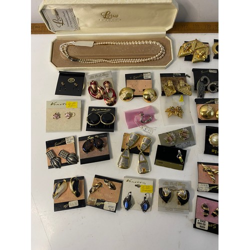 597 - Collection of designer costume jewellery from Swarovski, Monet, Liz Claiborne