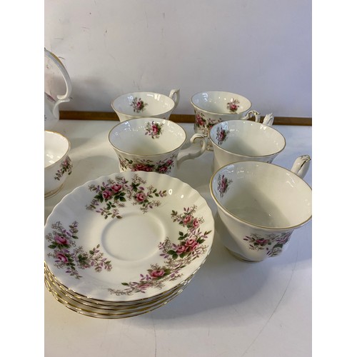 521 - Royal Albert Lavender Rose tea set comprising of teapot, milk and sugar bowl, 6 bowls, 6 cups and sa... 