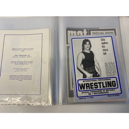 512 - Album of vintage wrestling programmes.