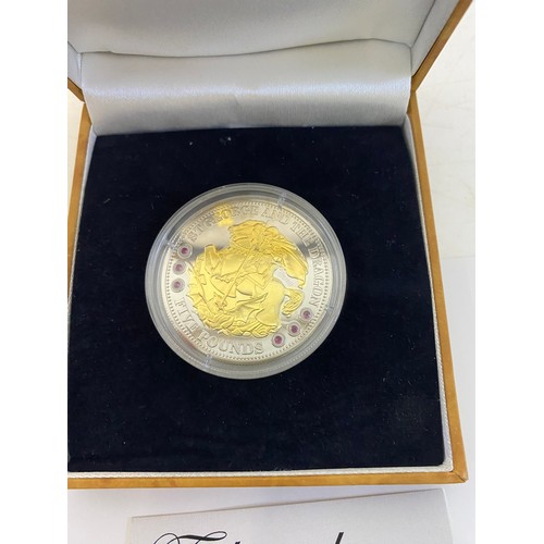 A boxed St George and the Dragon Rhodium plated £5 coin with sele ...
