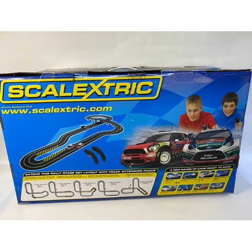 2 Scalextric sets, Rally Stage and Supreme Velocity. Parts may be mixed ...
