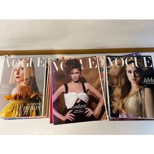 Large collection of Vogue magazines