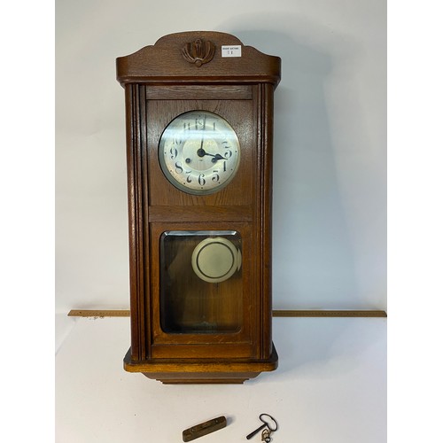 11 - Oak frame pendulum wall clock 80cms tall