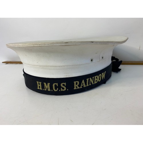 22 - Royal Navy cap H.M.S. Rainbow and leather ammunition pouch
