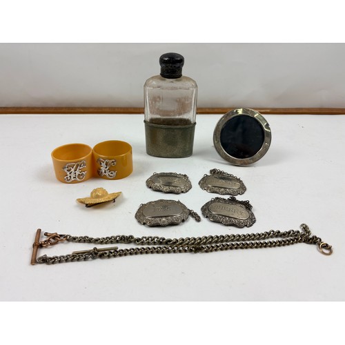 927 - Assortment of vintage curios to include Silver picture frame, pocket watch chains, napkin rings, spi... 